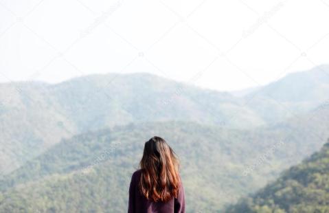depositphotos_87974692-stock-photo-girl-looking-at-far-mountains